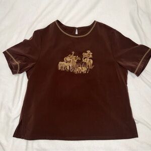 BonWorth brown short sleeve blouse with an animal safari print embroidery.